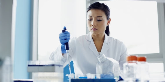 Female scientist testing samples in a lab