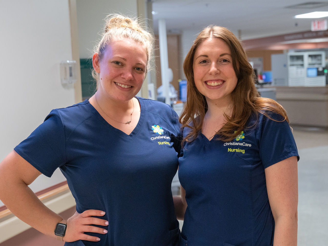 Two female ChristianaCare nurses smiling