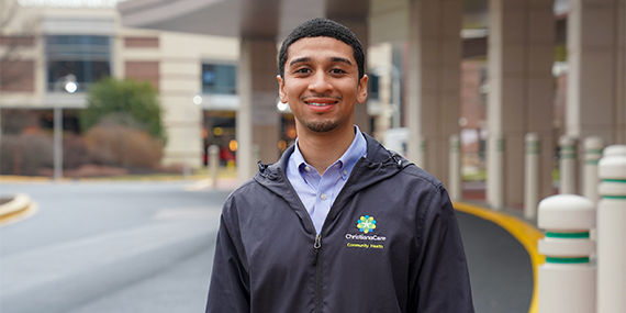 ChristianaCare Community Health Worker Kevin Moore smiles into the camera