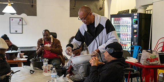 Community meal service in indoor setting
