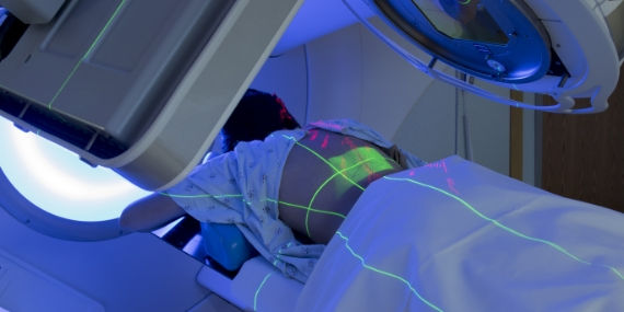 Patient getting scans of spine