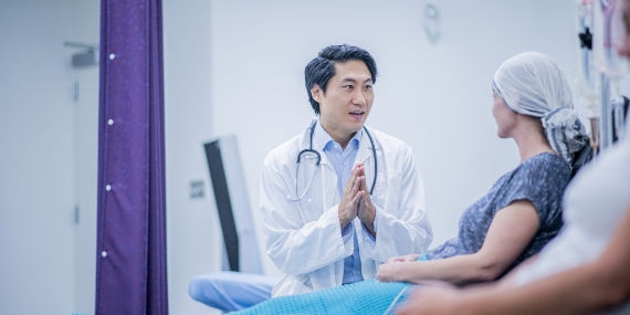 Doctor discussing cancer surgery with patient