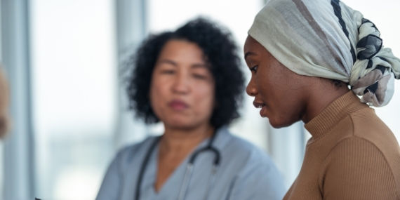 Caner patient with doctor