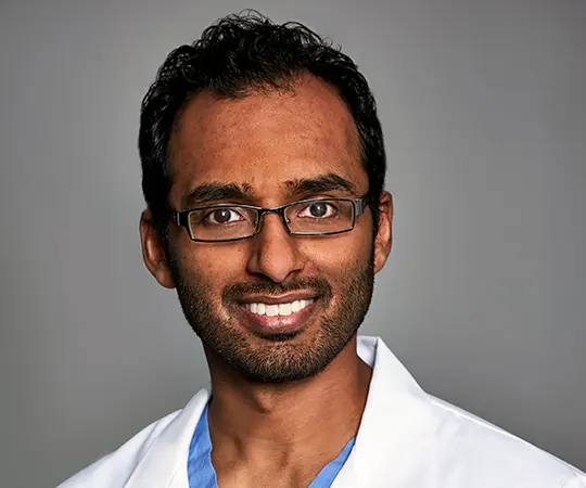 Headshot portrait of Dr. Thinesh Sivapatham