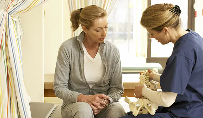 Patient being educated on bone health