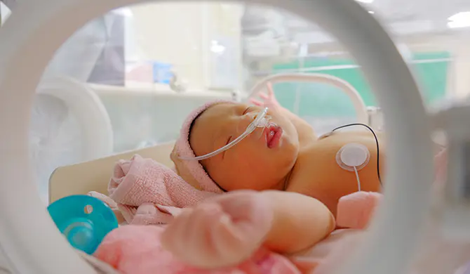 Baby in intensive care unit