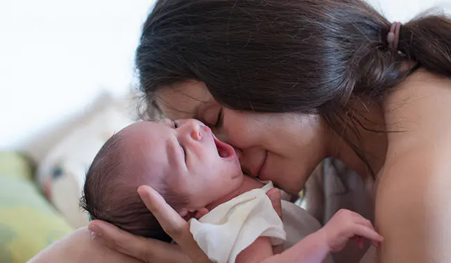 Mother with newborn baby
