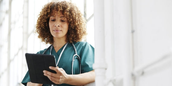 Nurse holding tablet