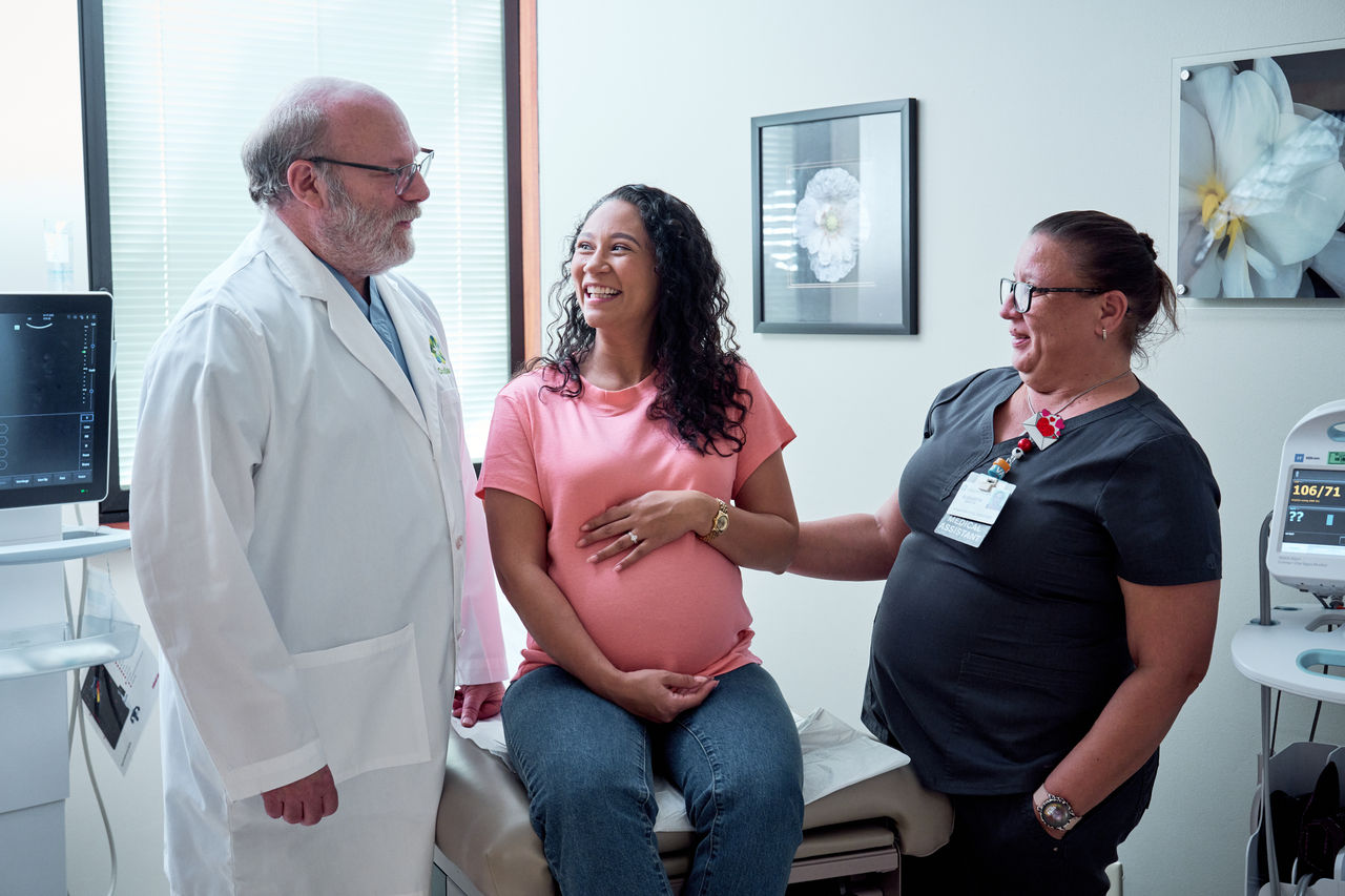Dr Fink and pregnant patient and medical assistant