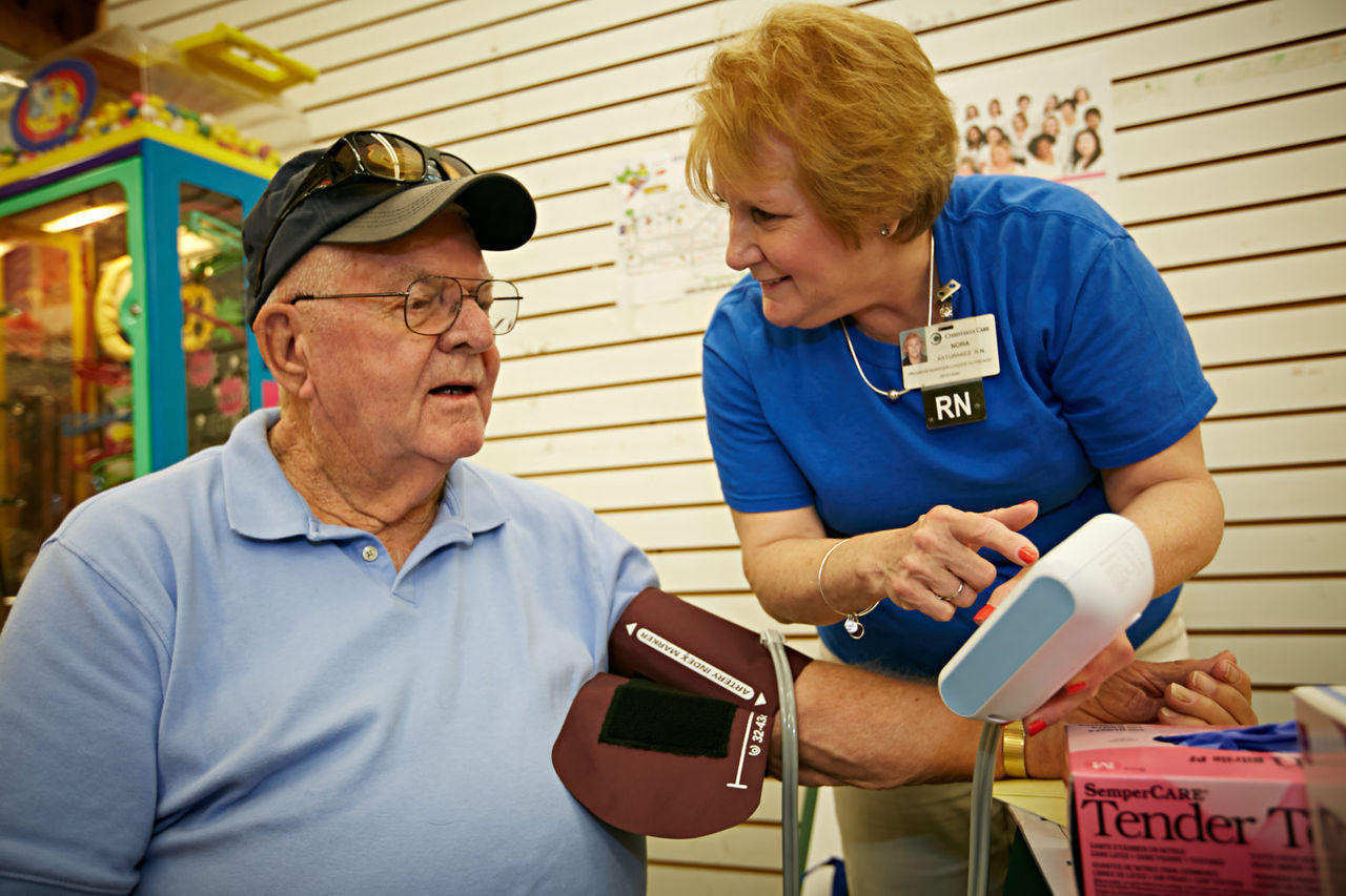 man having his blood pressure checked