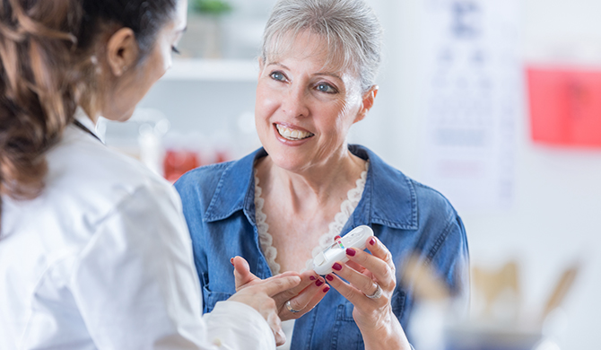 elderly woman with nurse