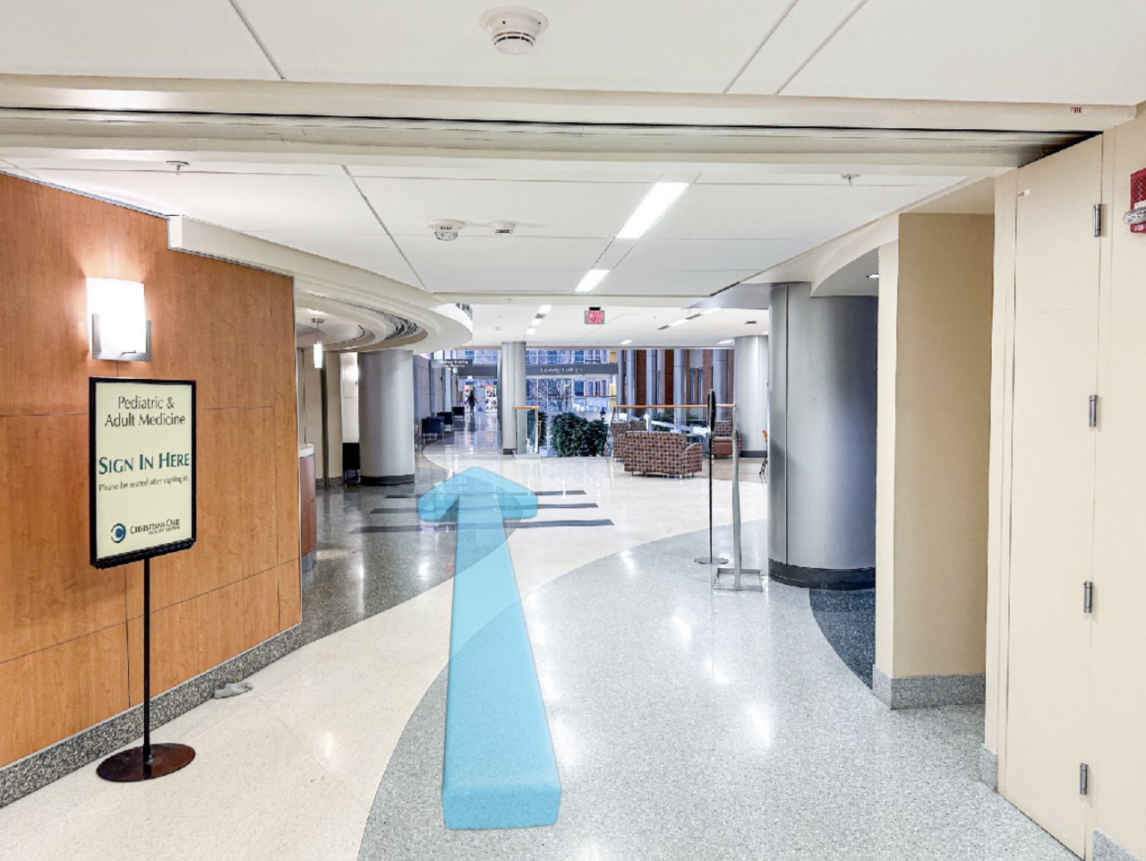 Step 10: Walk straight past the restaurant, Au Bon Pain, and keep left.