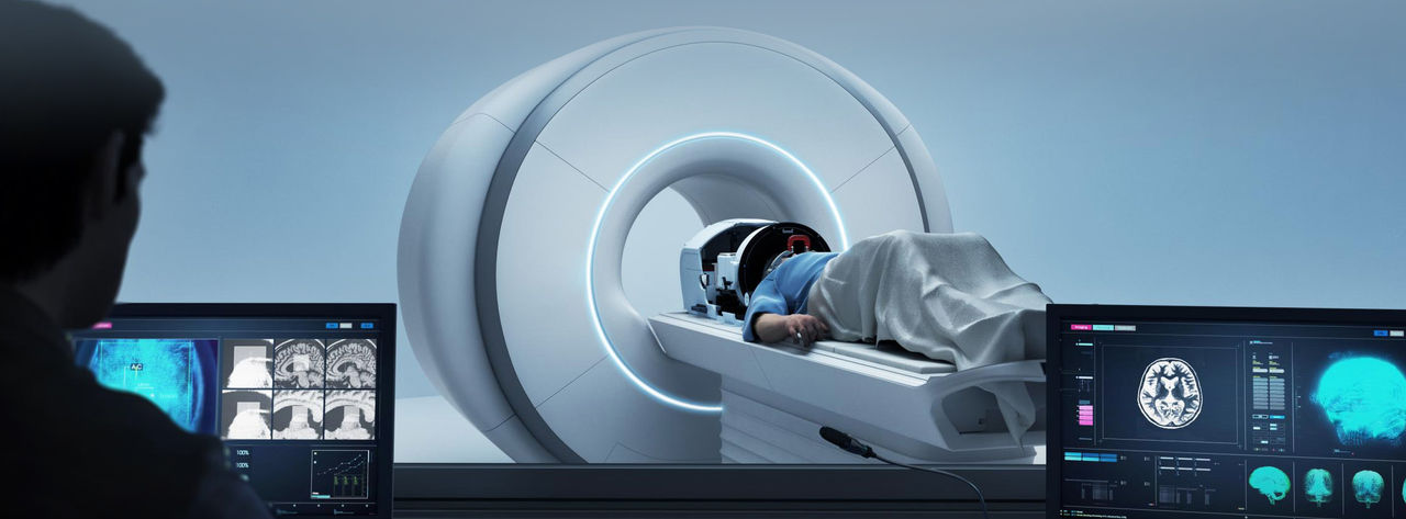 A patient lies on a table to receive a focused ultrasound treatment