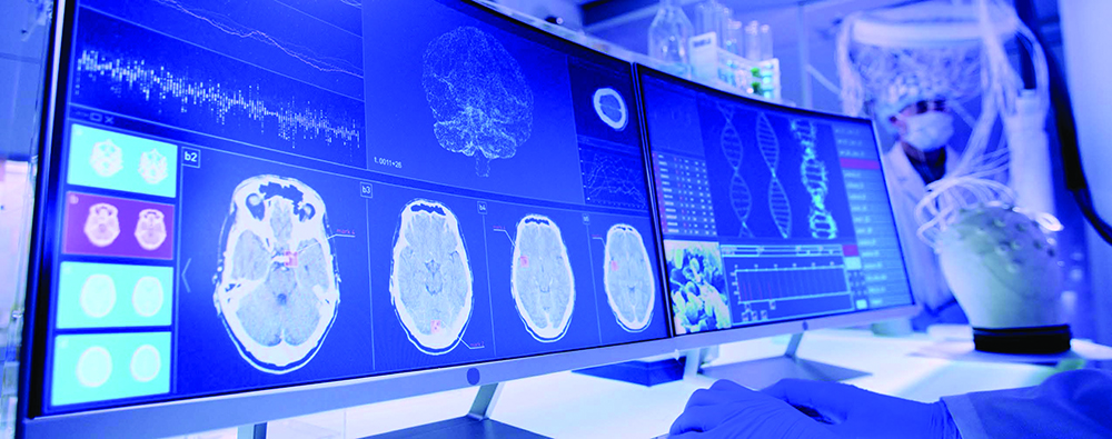 Multiple computer screens displaying various scans and test results