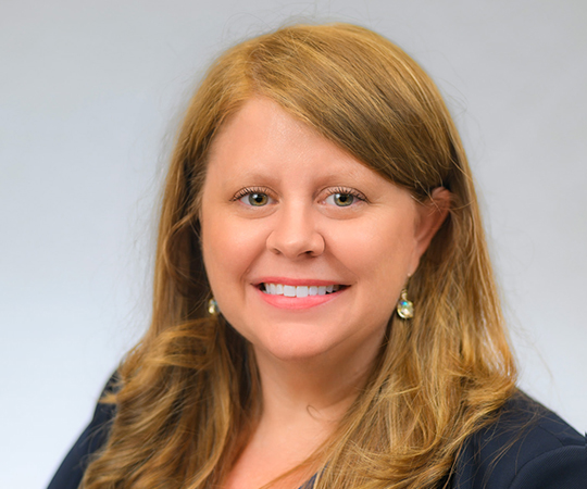 Doctor with glasses in white lab coat