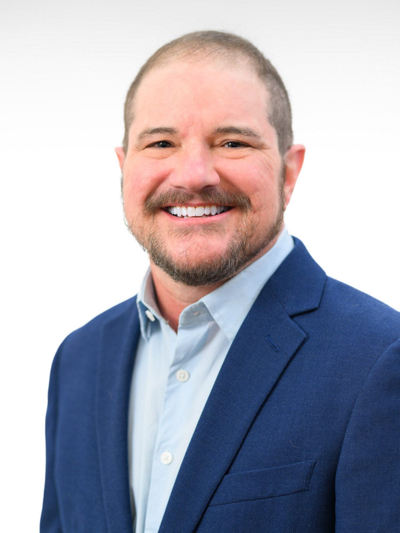 Smiling man in a blue suit