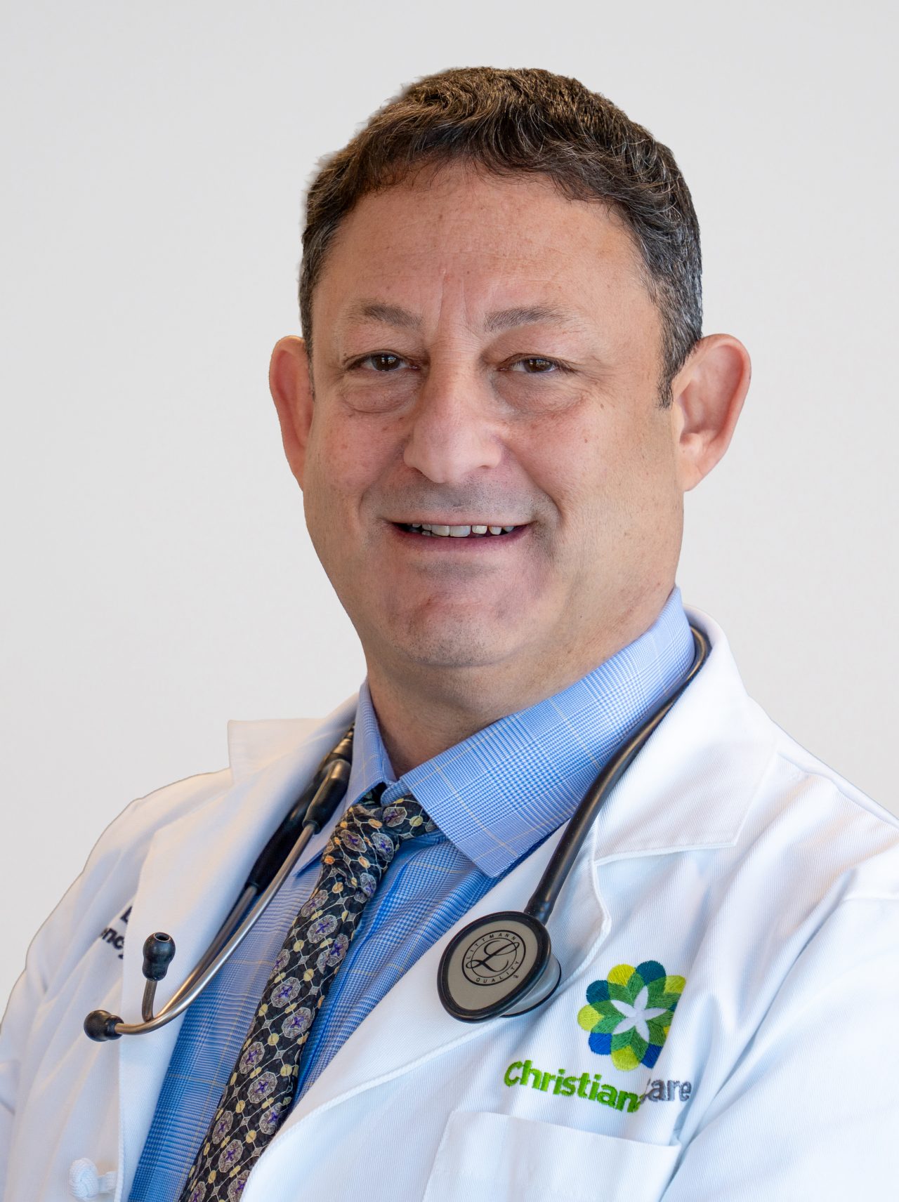 Smiling woman in lab coat