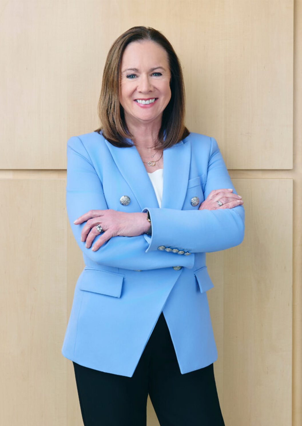 Smiling woman in lab coat