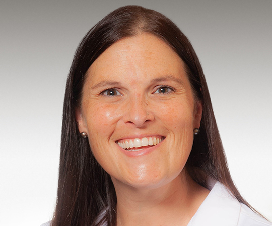 Doctor with glasses in white lab coat